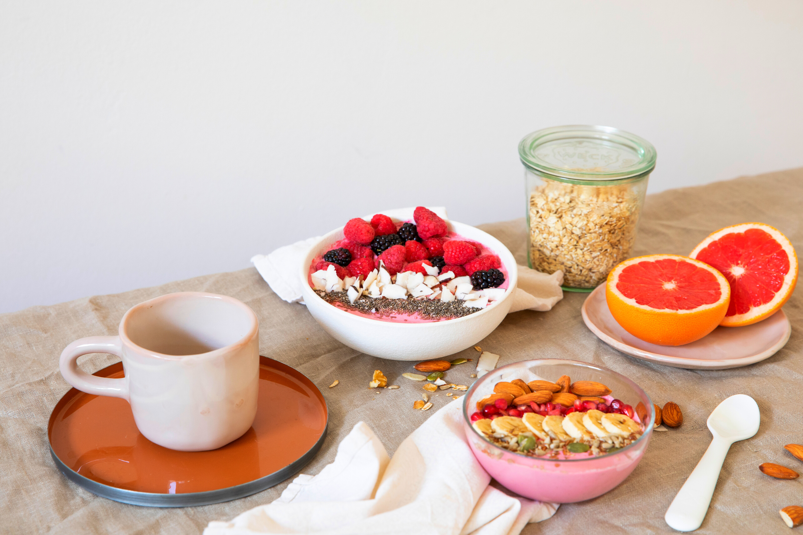 Cup of Drink, Smoothie Bowls, and Fresh Fruits on Table